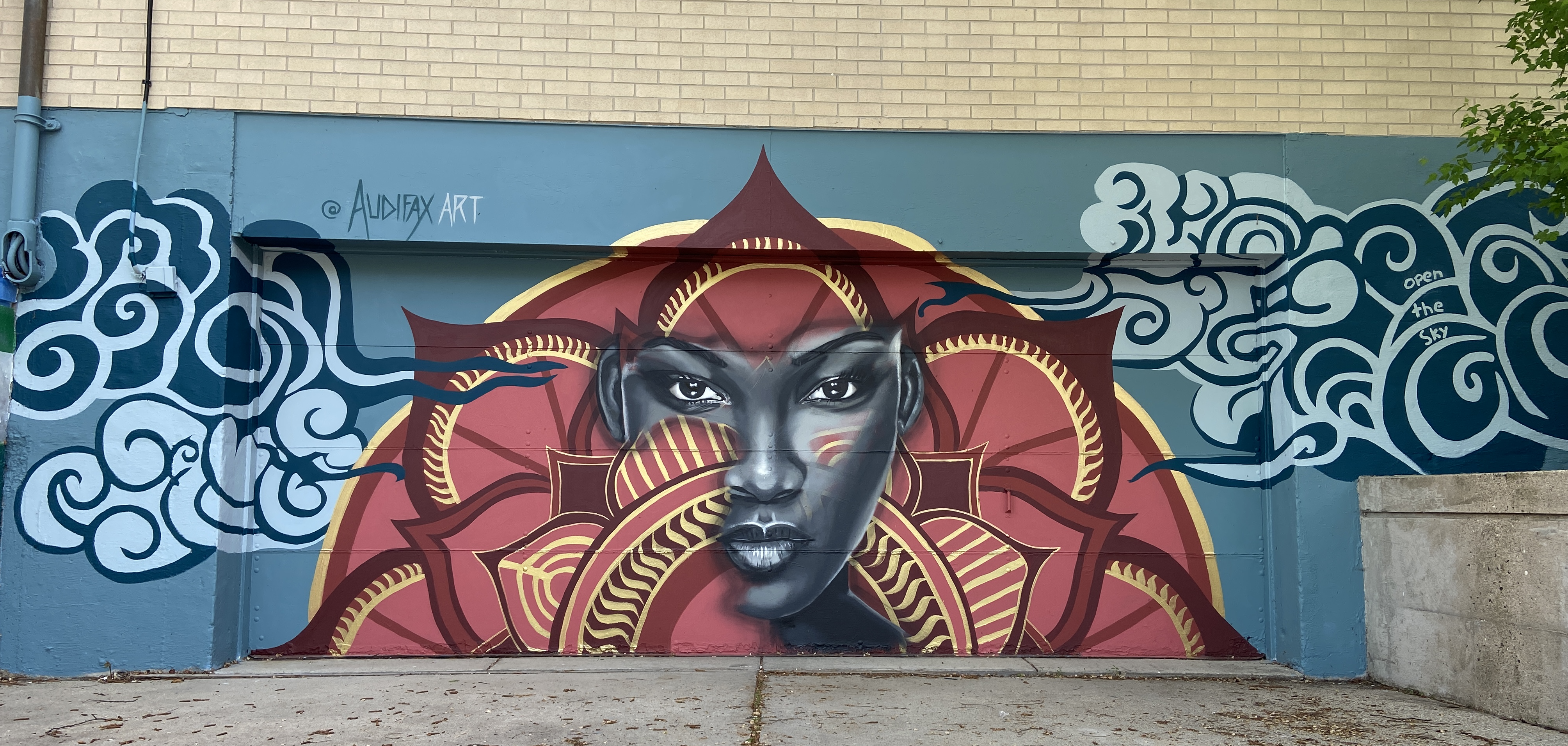 "Open the Sky" mural by Audifax and youth from Juvenile Shelter Home