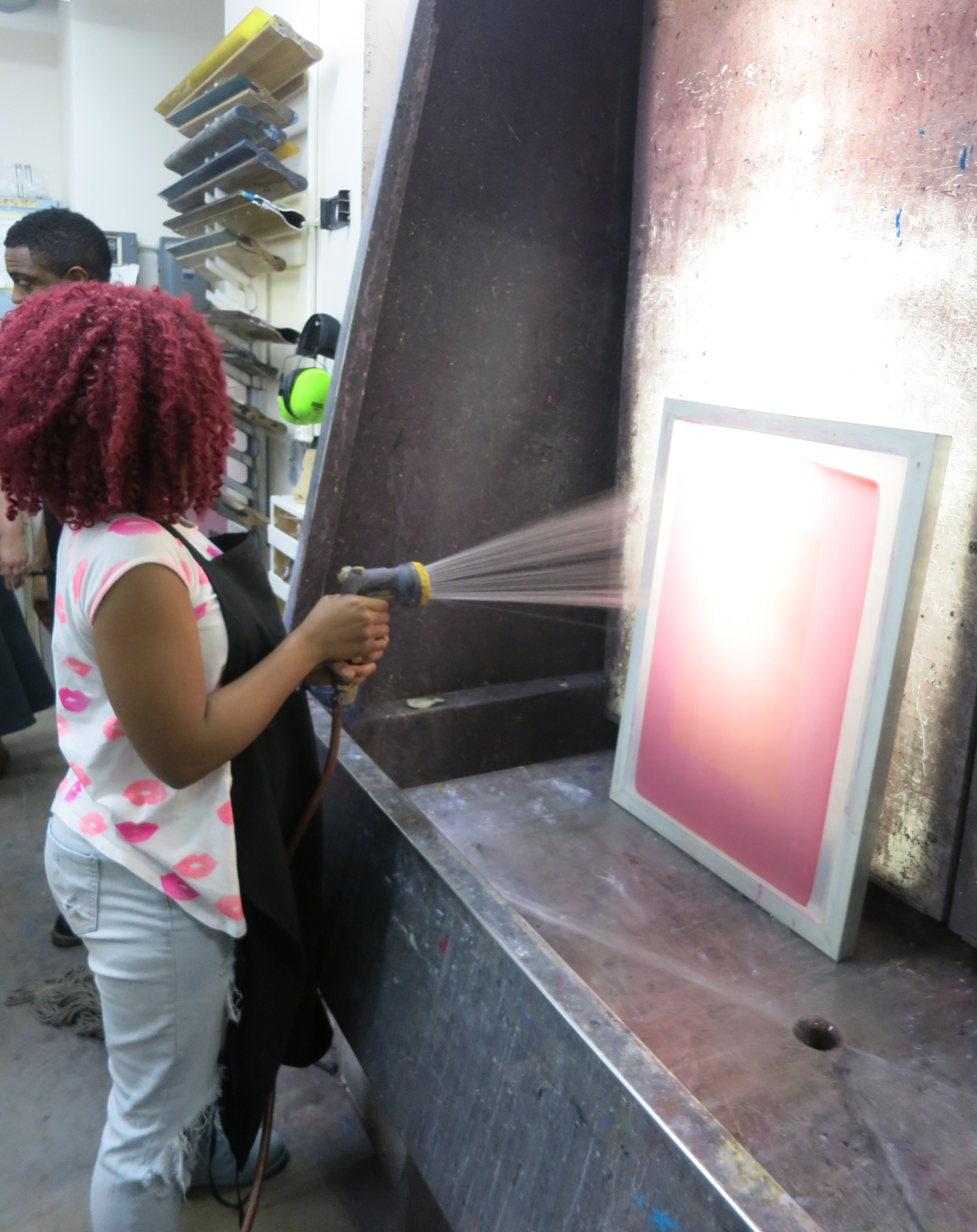 picture of teens screen printing during 15-week Air It Out semester