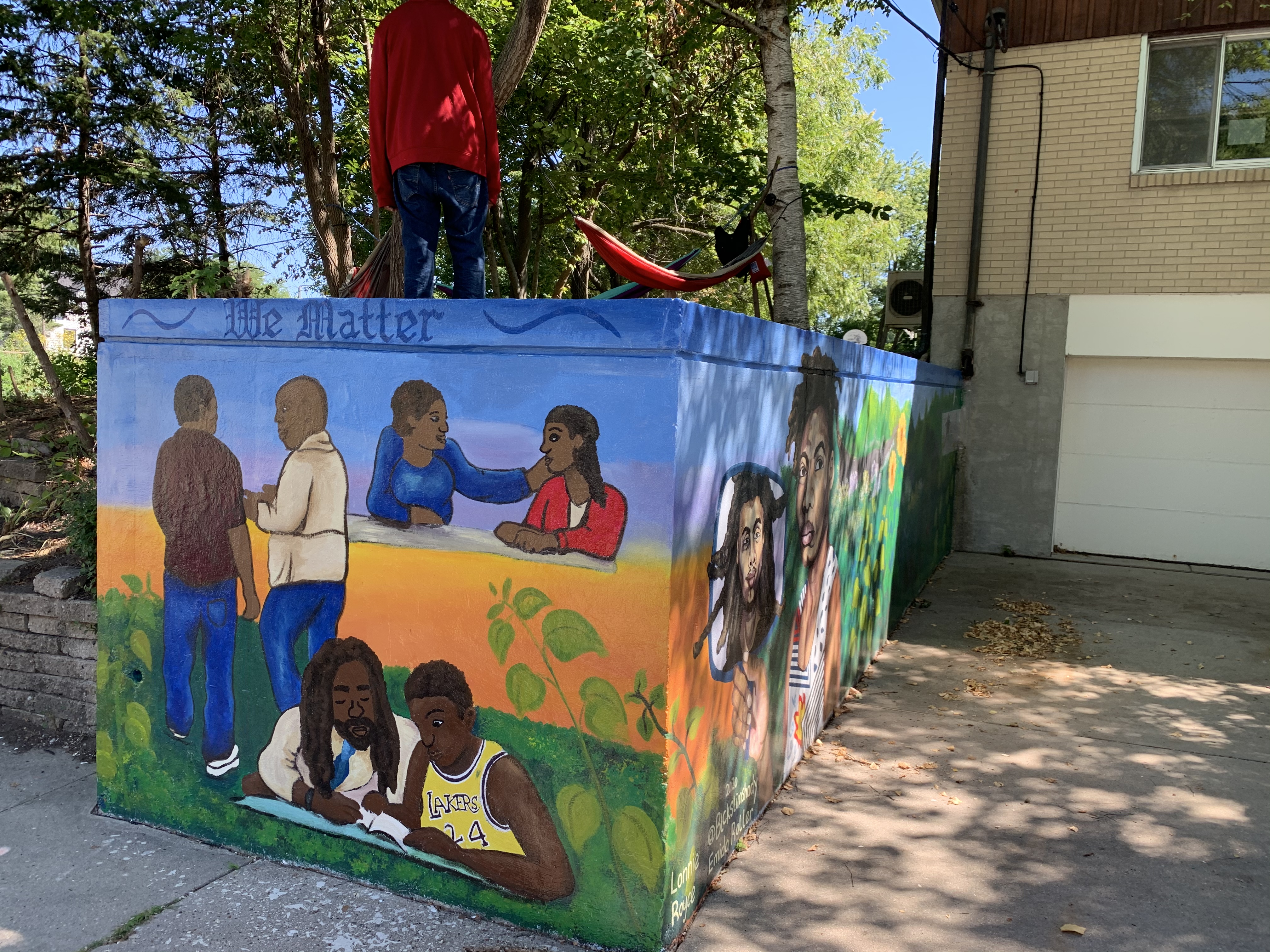 Madison Public Library's Bubbler Making Justice mural residency at Juvenile Court Shelter Home with Emida Roller and Shiloah Coley