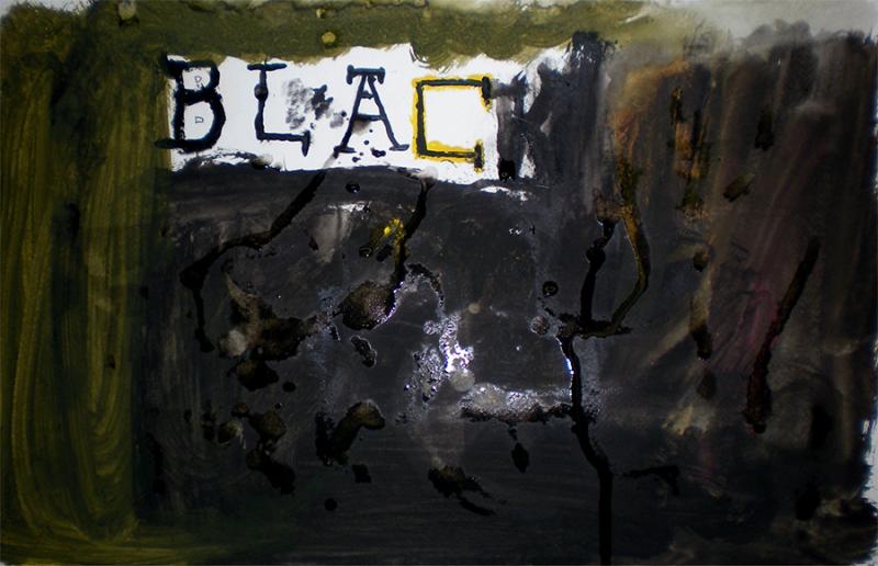 the word "black" surrounded by black paint covering the image